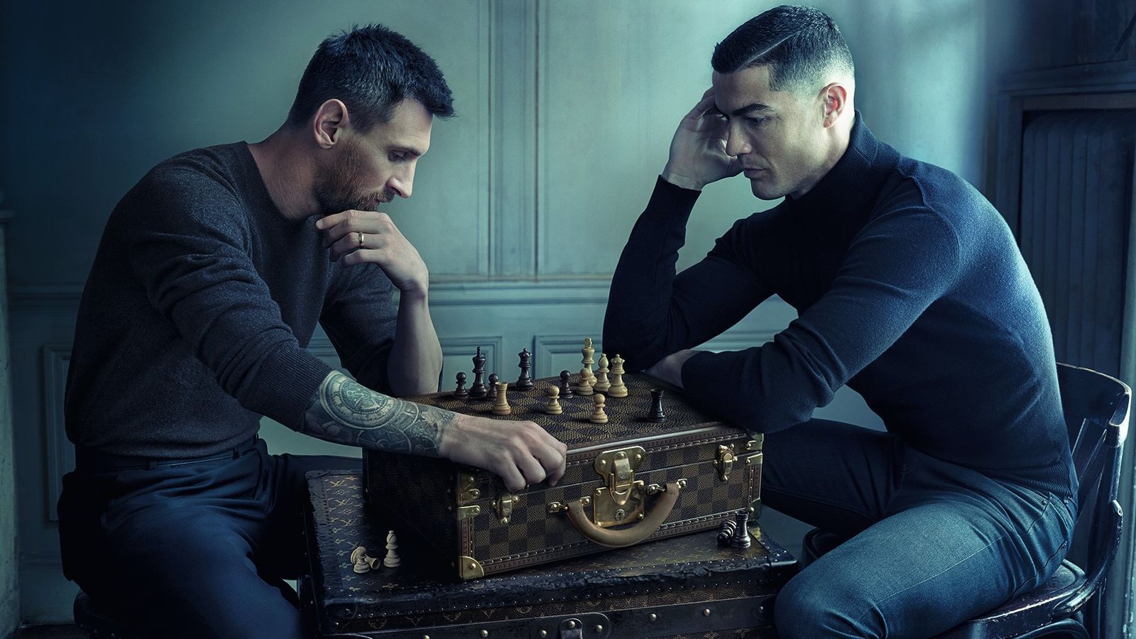 Lionel Messi and Cristiano Ronaldo playing chess