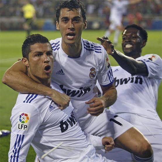 Cristiano Ronaldo celebrating with Real Madrid team mates after his winning goal against Barcelona in the 2011 Copa del Rey final