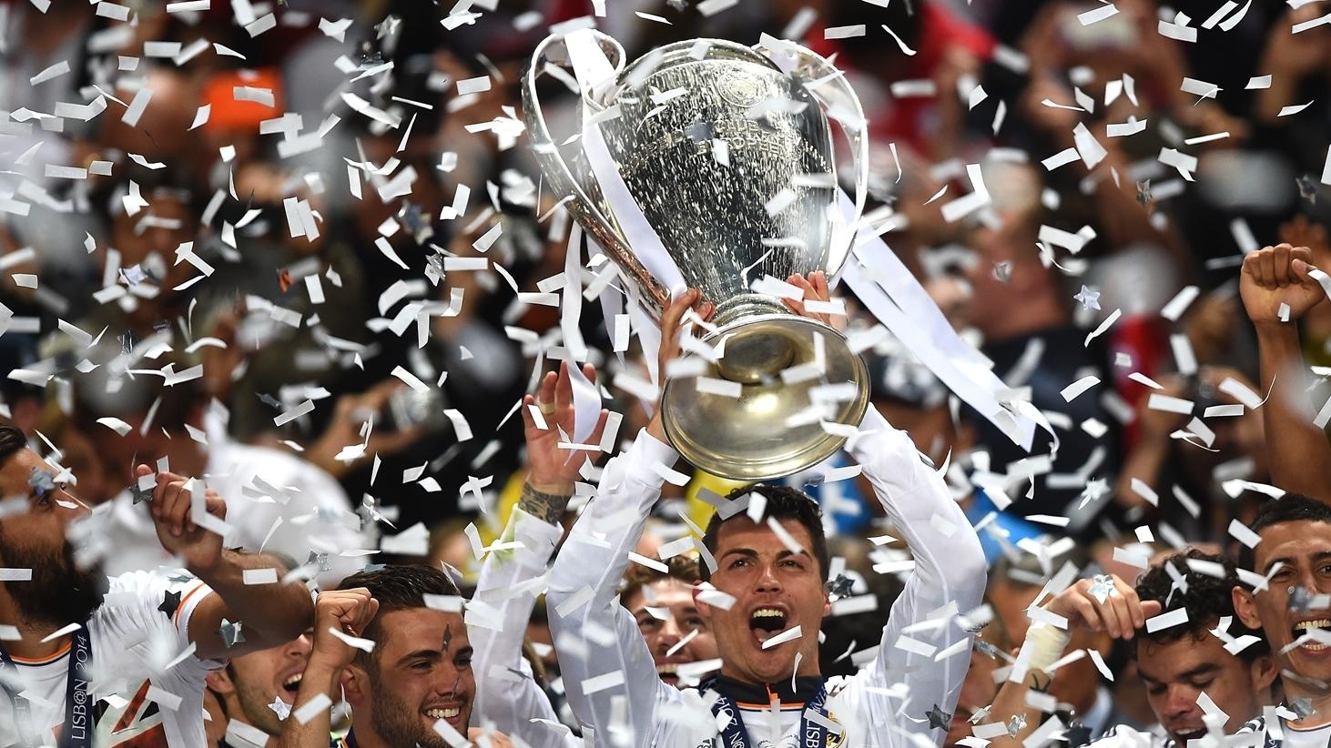 Cristiano Ronaldo lifting the UEFA Champions League trophy with Real Madrid in Lisbon in 2014